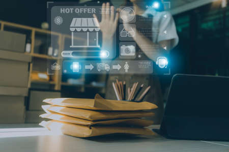 Attractive Asian SME business woman working at home office. online shopping concept