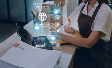 Attractive Asian SME business woman working at home office. online shopping concept