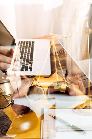 Business and lawyers discussing contract papers with brass scale on desk in office. Law, legal...