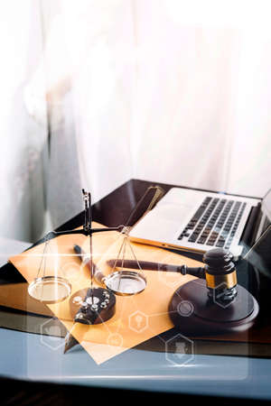 Business and lawyers discussing contract papers with brass scale on desk in office. Law, legal...
