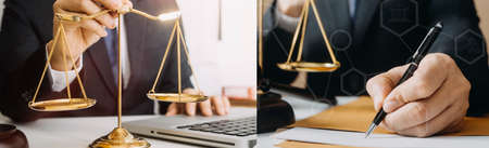 Justice and law concept.Male judge in a courtroom with the gavel, working with, computer and docking...
