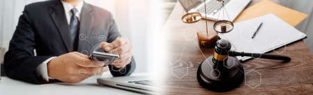 Business and lawyers discussing contract papers with brass scale on desk in office. Law, legal...