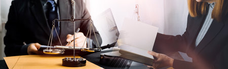 justice and law concept.Male judge in a courtroom on wooden table and Counselor or Male lawyer...
