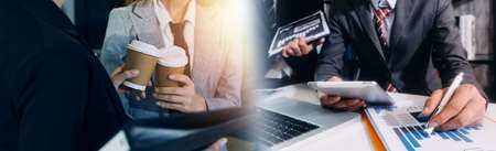 Business team finance or bookkeeper working with a calculator to calculate business data summary...