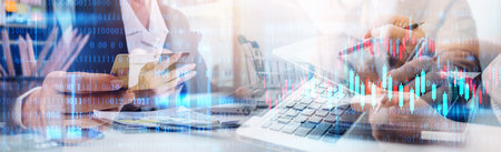 Business team finance or bookkeeper working with a calculator to calculate business data summary...