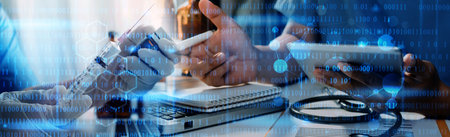 Medicine doctor hand working on a patients x-ray scans digital healthcare and connection with modern...