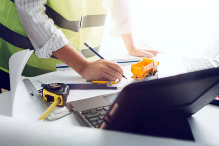 Business and lawyers discussing contract papers with brass scale on desk in office. Law, legal...