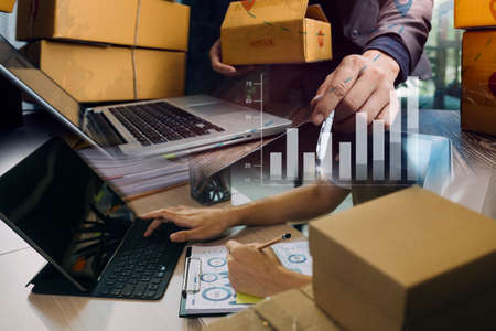 Portrait of Starting small businesses SME owners, two Asian woman check online orders Selling...