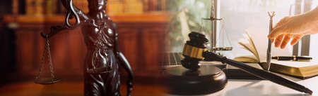 Justice and law concept.Male judge in a courtroom with the gavel, working with, computer and docking...