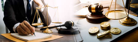 Business and lawyers discussing contract papers with brass scale on desk in office. Law, legal...