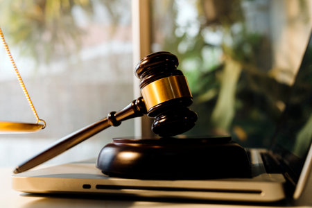 Business and lawyers discussing contract papers with brass scale on desk in office. Law, legal...