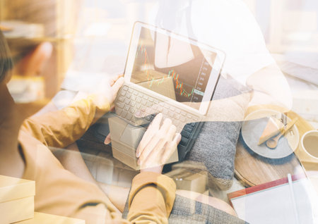 Portrait of Starting small businesses SME owners, two Asian woman check online orders Selling...