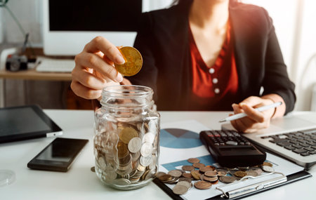 Business accounting concept, Business man using calculator with computer laptop, budget and loan...