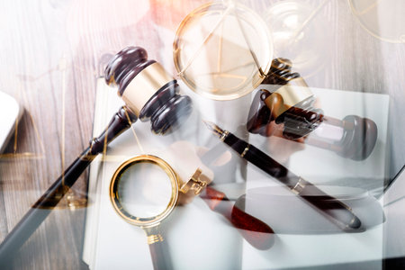 Justice and law concept.Male judge in a courtroom with the gavel, working with, computer and docking...