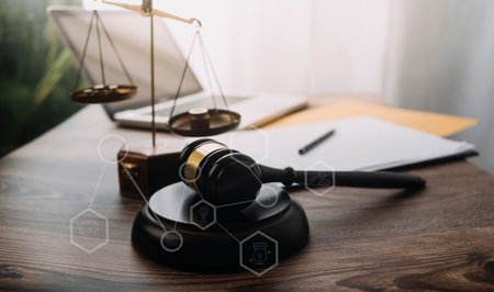 Business and lawyers discussing contract papers with brass scale on desk in office. Law, legal...