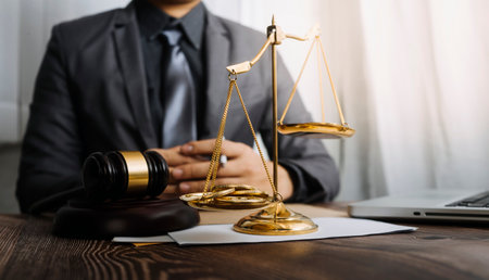 Justice and law concept.Male judge in a courtroom with the gavel, working with, computer and docking...