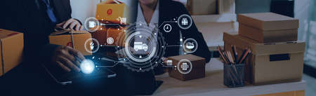 Startup small business entrepreneur or freelance Asian woman using a laptop with box, Young success...