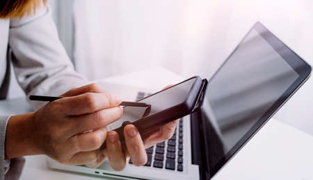 Business People Meeting to analyse and discuss and brainstorming the financial report chart data in office Financial advisor teamwork and accounting concept.の写真素材