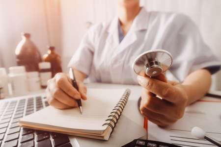Medicine doctor and stethoscope touching icon medical network connection with modern interface on...