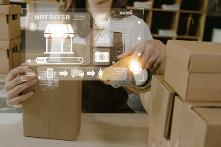 Attractive Asian SME business woman working at home office. online shopping concept