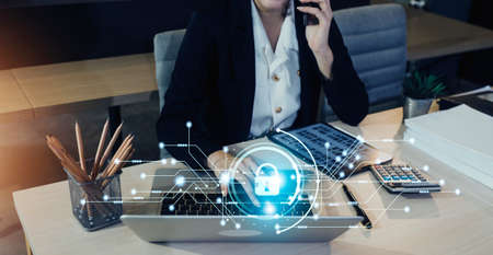 Cyber Security Internet And Networking Concept. Businessman Hand Working With laptop computer and...
