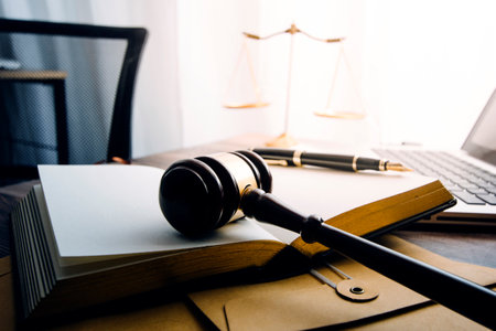 Business and lawyers discussing contract papers with brass scale on desk in office. Law, legal...
