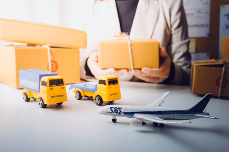 Online sales ideas for work at home. Asian man is answering phone calls. To accept orders from...