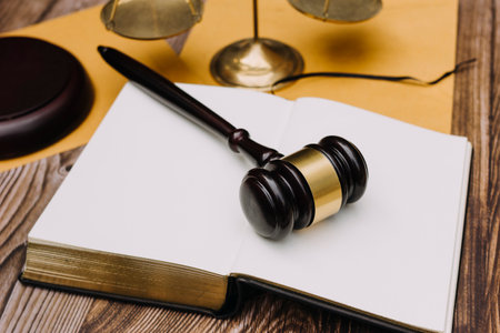 Business and lawyers discussing contract papers with brass scale on desk in office. Law, legal...
