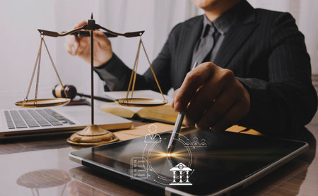 justice and law concept.Male judge in a courtroom on wooden table and Counselor or Male lawyer...