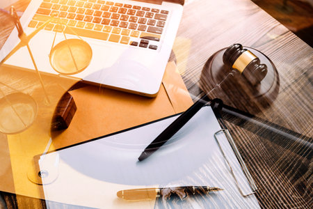 justice and law concept.Male judge in a courtroom on wooden table and Counselor or Male lawyer...