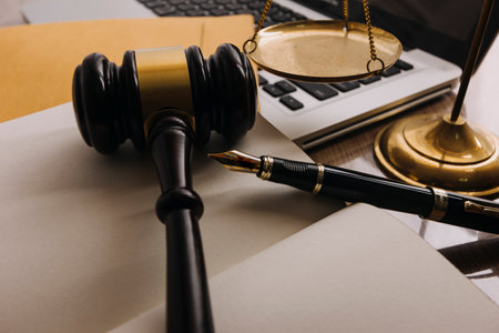 justice and law concept.Male judge in a courtroom on wooden table and Counselor or Male lawyer...