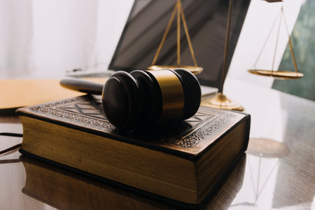 Business and lawyers discussing contract papers with brass scale on desk in office. Law, legal...
