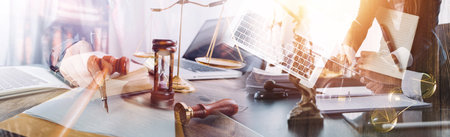Business and lawyers discussing contract papers with brass scale on desk in office. Law, legal...