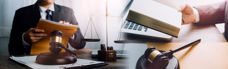 Business and lawyers discussing contract papers with brass scale on desk in office. Law, legal...