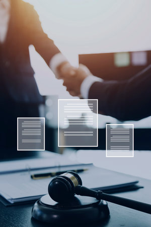 Justice and law concept.Male judge in a courtroom with the gavel, working with, computer and docking...