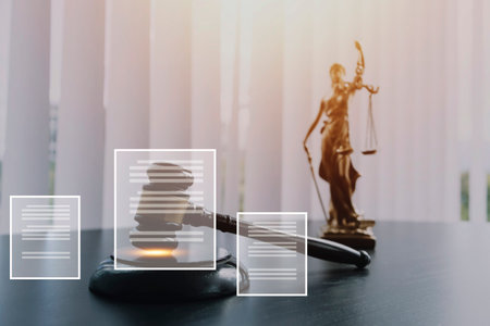 Justice and law concept.Male judge in a courtroom with the gavel, working with, computer and docking...
