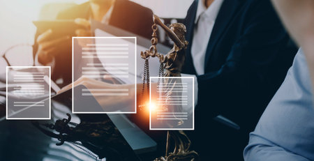 Justice and law concept.Male judge in a courtroom with the gavel, working with, computer and docking...
