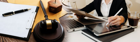 Business and lawyers discussing contract papers with brass scale on desk in office. Law, legal...