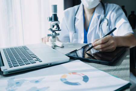 Medicine doctor or pharmacist use tablet or mobile phone.Health care and medical or Health Insurance...