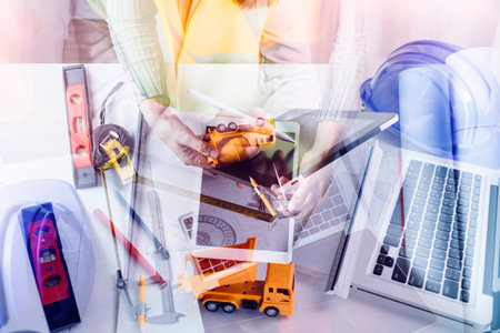 Scene of industrial engineers discussion, Construction architect with huge industry as a background,...
