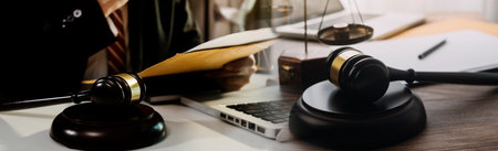 Business and lawyers discussing contract papers with brass scale on desk in office. Law, legal...