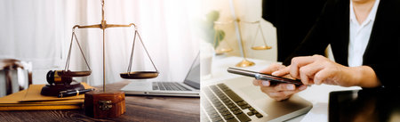 justice and law concept.Male judge in a courtroom on wooden table and Counselor or Male lawyer working in office. Legal law, advice and justice concept.の写真素材