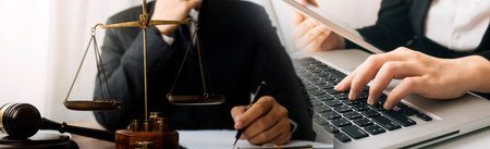 justice and law concept.Male judge in a courtroom on wooden table and Counselor or Male lawyer...