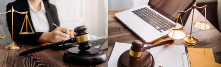 Justice and law concept.Male judge in a courtroom with the gavel, working with, computer and docking...