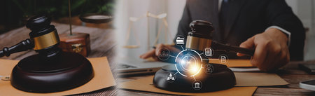 Justice and law concept.Male judge in a courtroom with the gavel, working with, computer and docking...