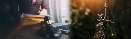 Justice and law concept.Male judge in a courtroom with the gavel, working with, computer and docking...