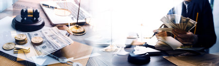 Business and lawyers discussing contract papers with brass scale on desk in office. Law, legal...