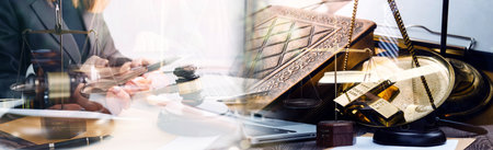 Business and lawyers discussing contract papers with brass scale on desk in office. Law, legal...