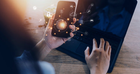 businessmen Fingerprint scanning and biometric authentication, processing of biometric for access personal data. surveillance and security scanning of digital programs cyber futuristic applicationsの写真素材