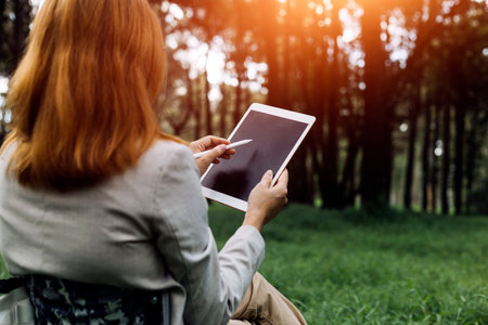 Business team present. professional investor working new start up project. Finance managers meeting.Digital tablet docking screen computer design smart phone using, in morning lightの写真素材